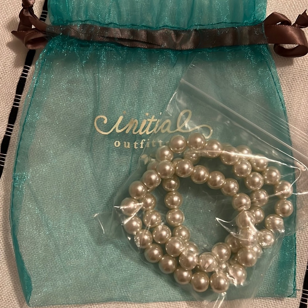 Three pearl bracelets